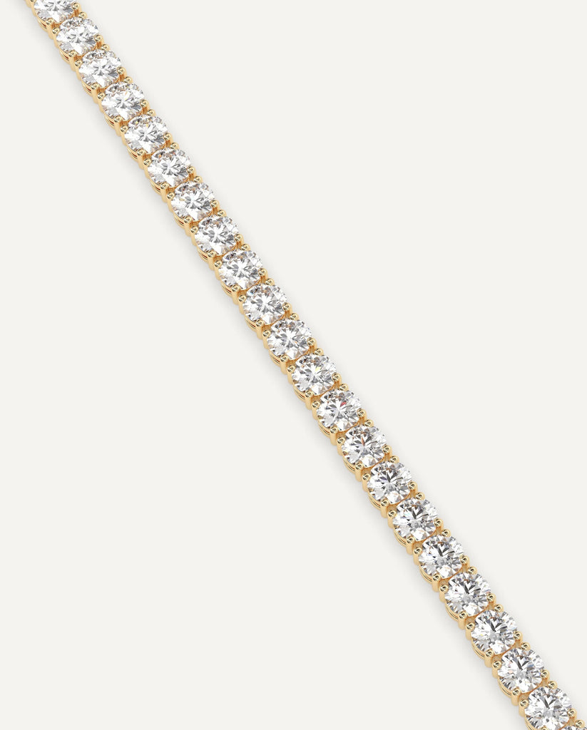 classic diamond tennis bracelet with round natural diamonds in yellow gold