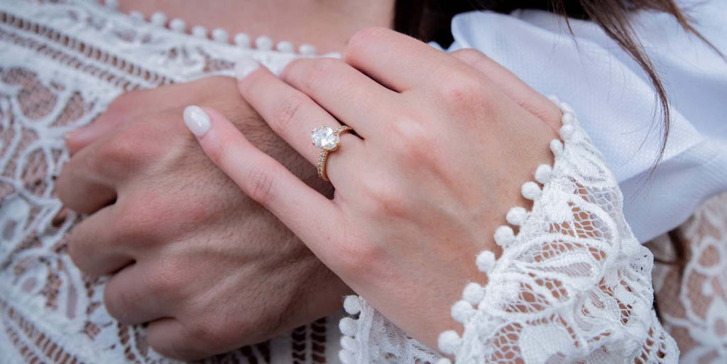 Engagement ring on brides hand