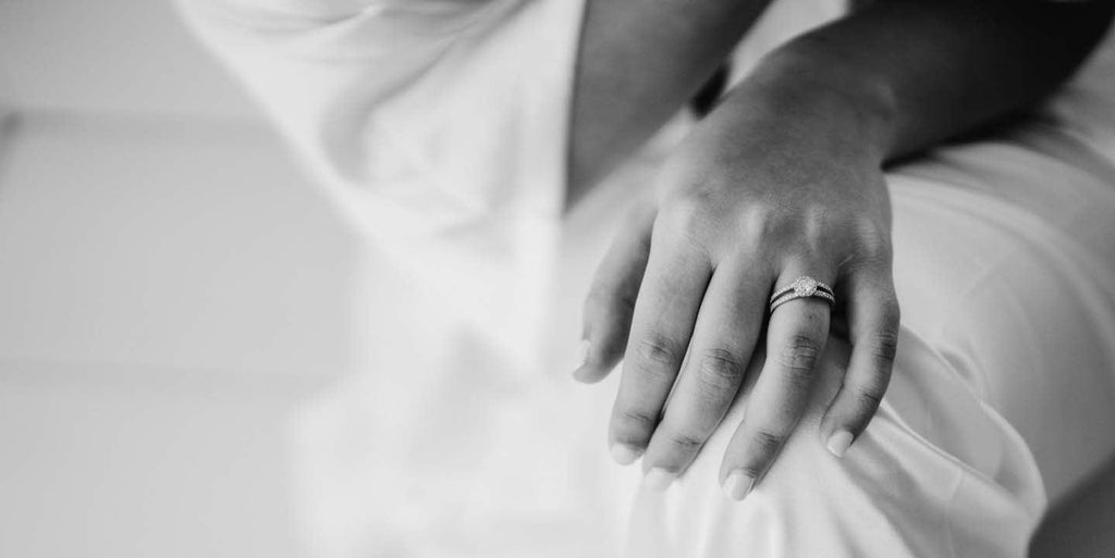 Round shape halo engagement ring on bride