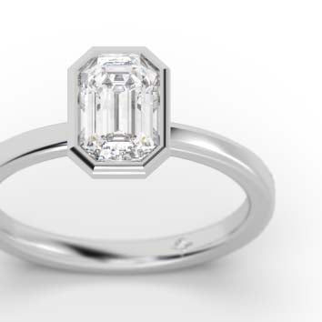 Bezel set natural emerald cut diamond engagement ring