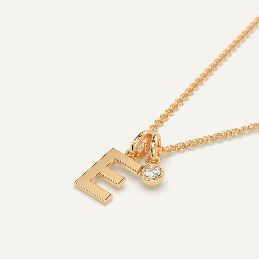 Gold initial E necklace