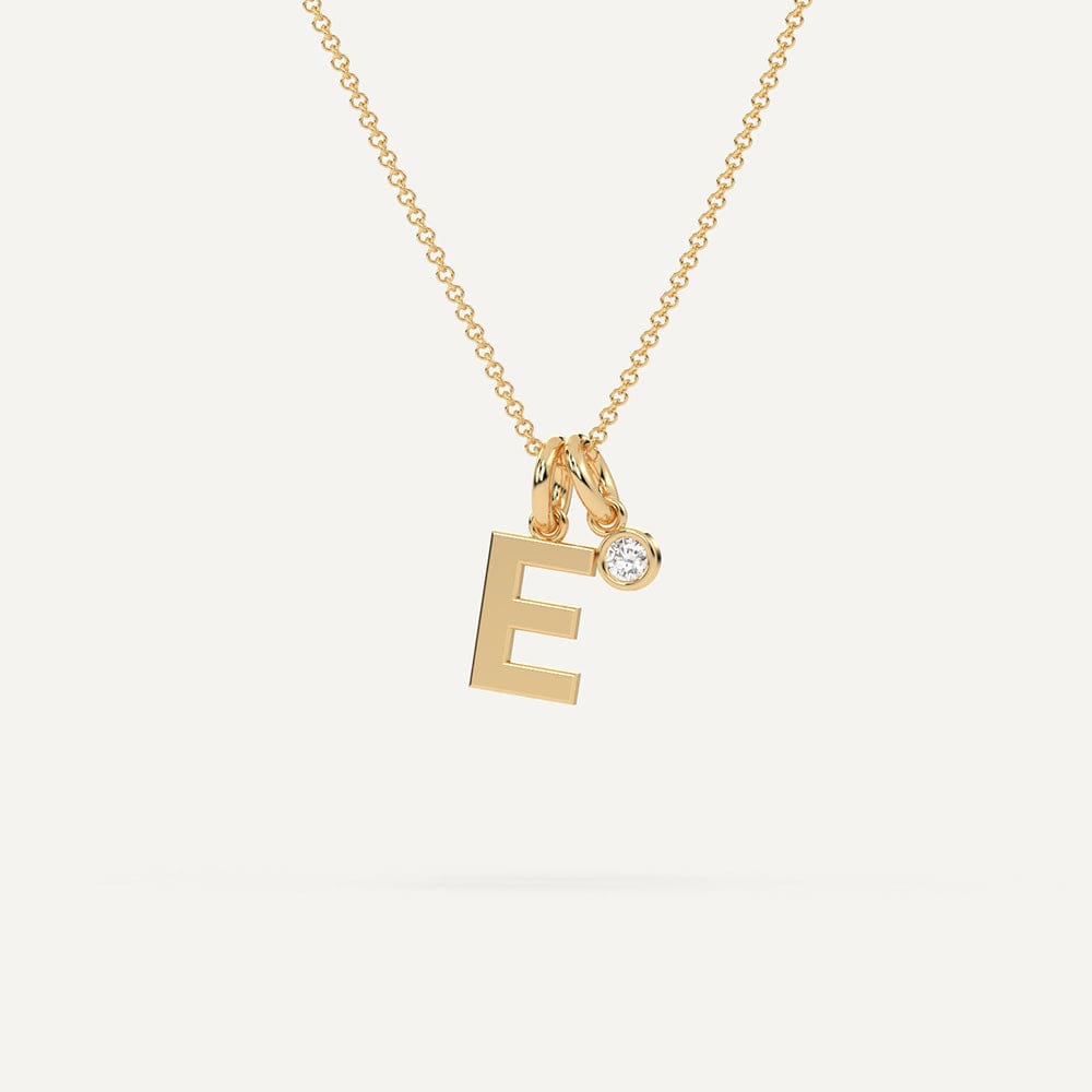Yellow gold E letter pendant