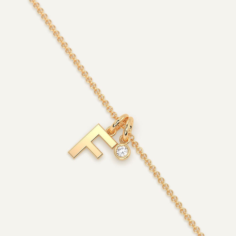 Diamond F white gold necklace