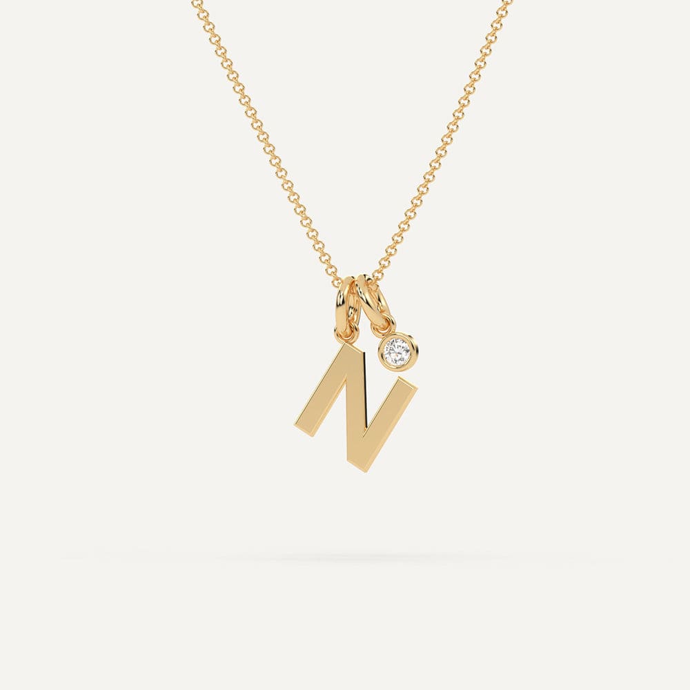 Yellow gold N letter pendant
