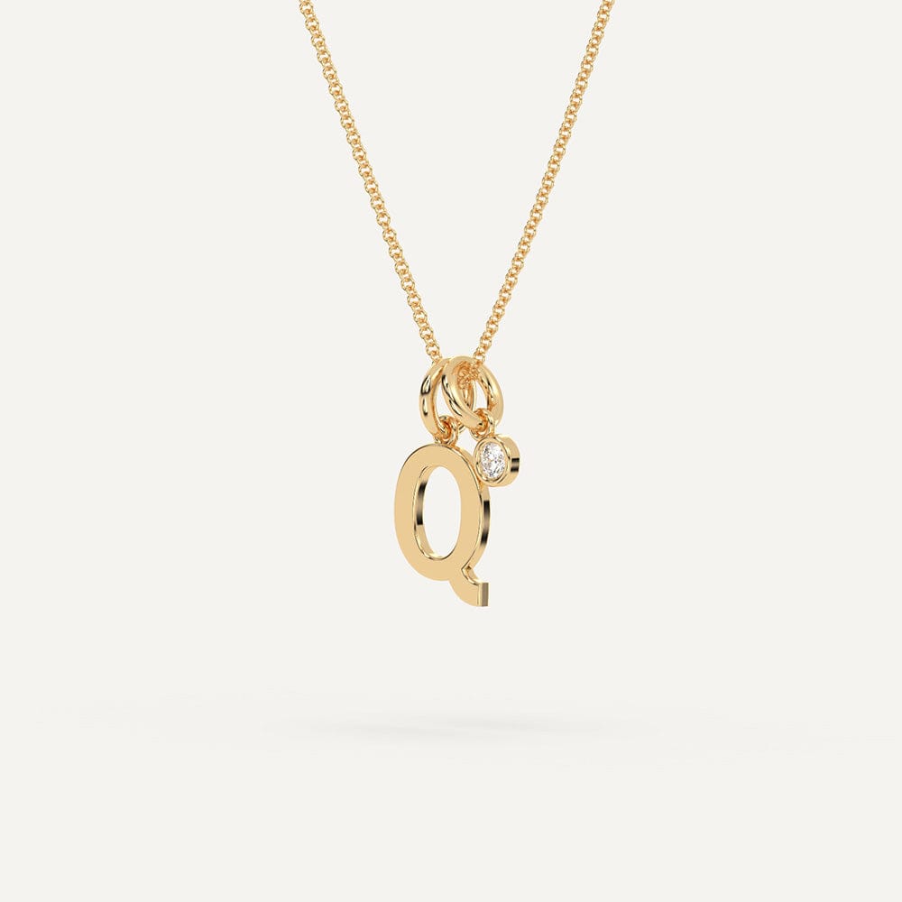 Gold Q initial pendant necklace