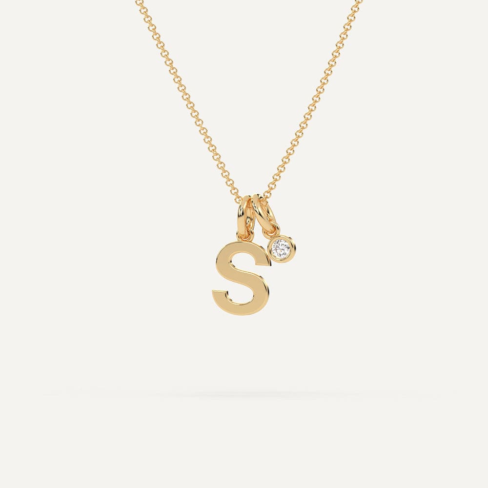 Yellow gold S letter pendant