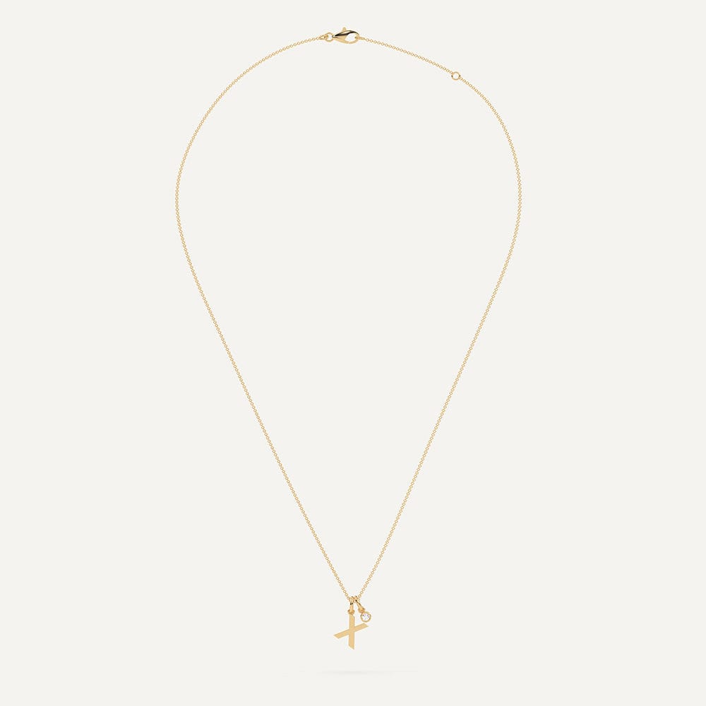 Gold necklace with letter X