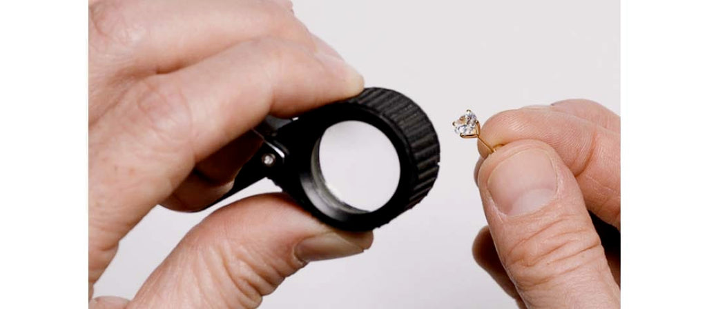 Jewelers loupe inspecting diamond clarity