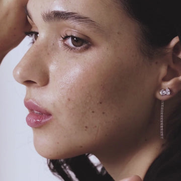 Female Model Wearing Diamond Earrings with Tennis Dangling Strips