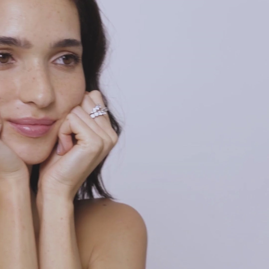 Female Model Wearing Wedding Bands and Diamond Eternity Rings