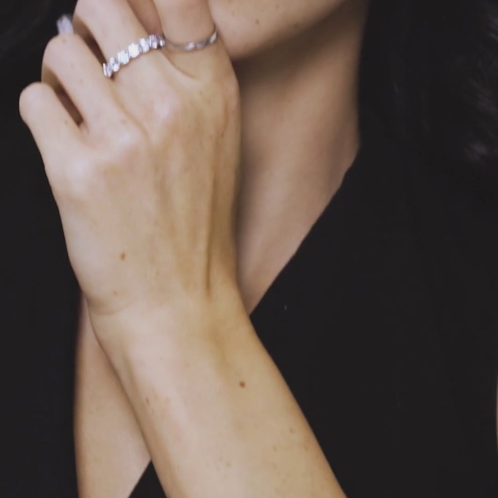 Female Model Wearing Diamond and Plain Rings