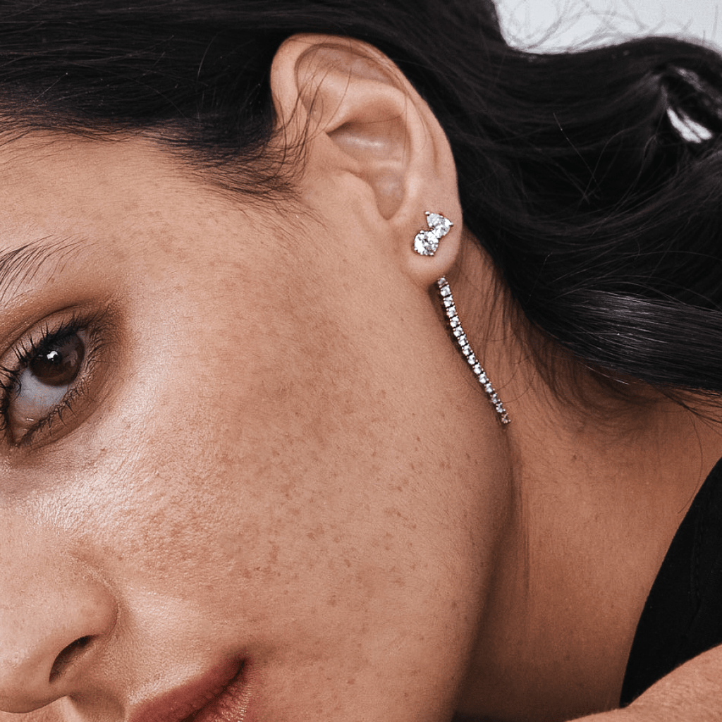 Round Pear Stud Earrings On Female Model Ear