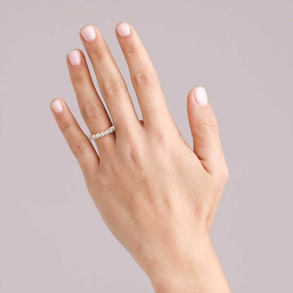 Diagonal Leaf Style Oval Moissanite Semi Eternity Band Ring